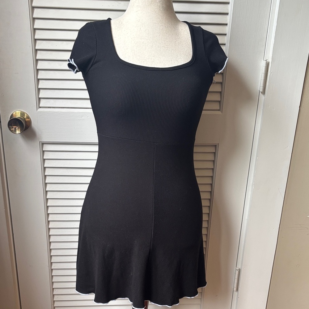 See you Monday black with white trim mini dress